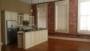 kitchen with brick wall